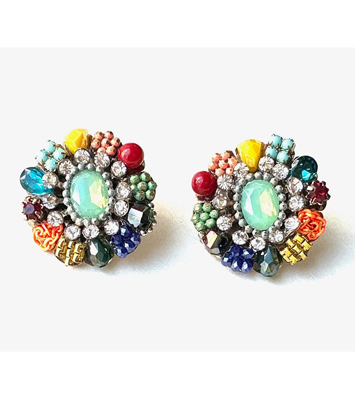 A pair of colorful E2111 earrings shaped like flowers.