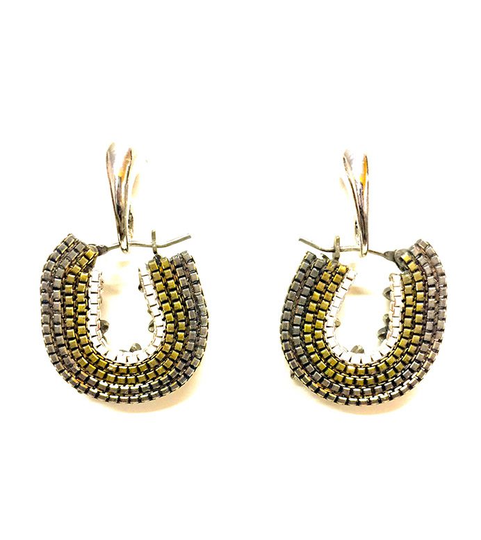 A pair of E2108 earrings with gold and silver beading.
