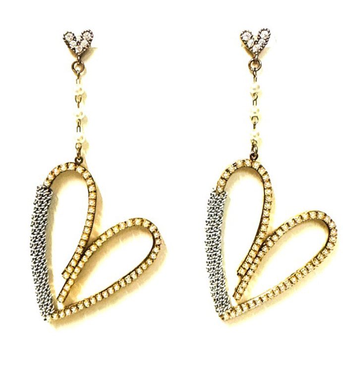 A pair of E2106 heart shaped earrings with diamonds.