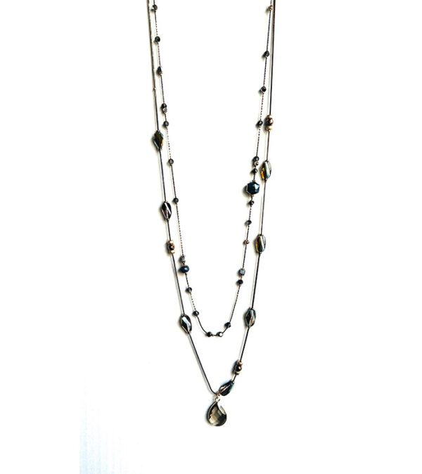 A long NK8901 necklace with black and silver beads.