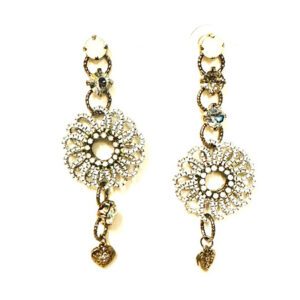 A pair of E2102 earrings with rhinestones and pearls.