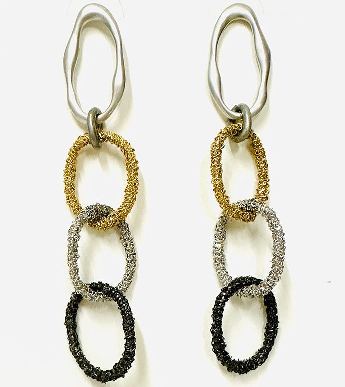 A pair of E2076 earrings with black, gold, and silver beads.