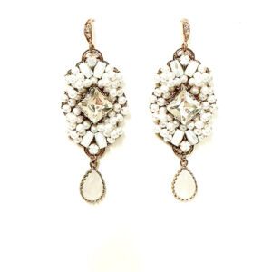 A pair of E2062 earrings with white stones and crystals.