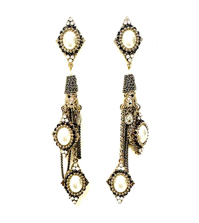 A pair of E2052 earrings with pearls and tassels.