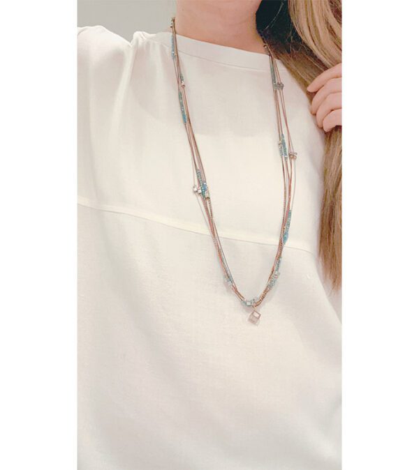 A woman wearing a white shirt and the NK5961 (Multi /Dark) necklace.