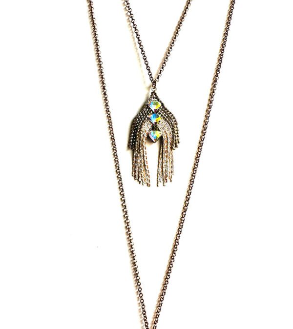 A NK4581(White Opal) necklace with crystals and feathers.