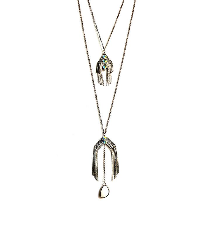 Two NK4581(White Opal) with tassels on them.