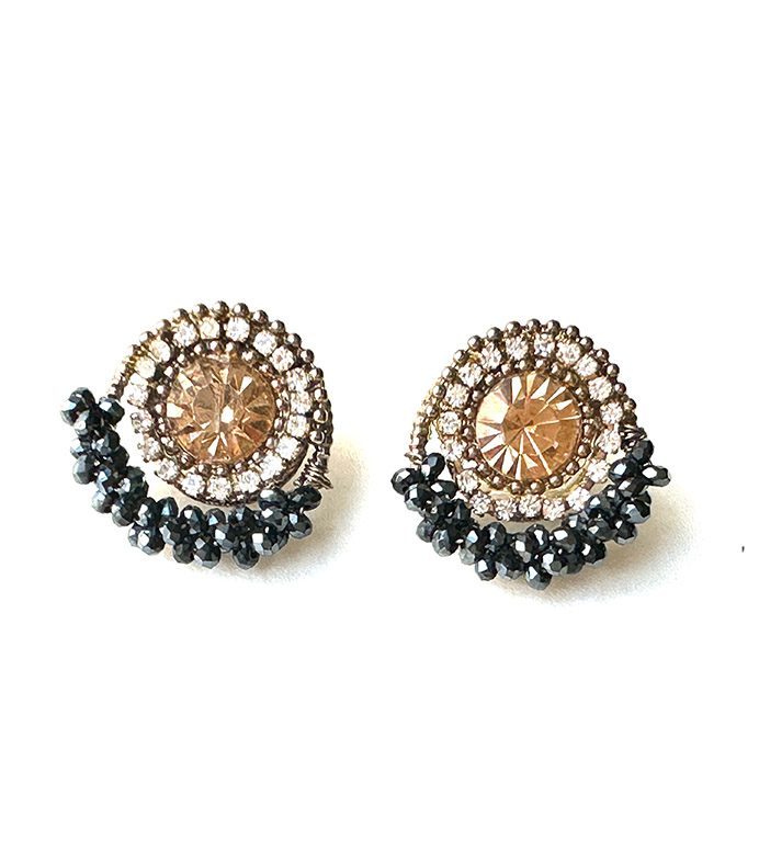A pair of E933 (Citrine) earrings with black and gold beads.