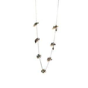 A long NK4570 (Pastel) necklace with a lot of flowers on it.