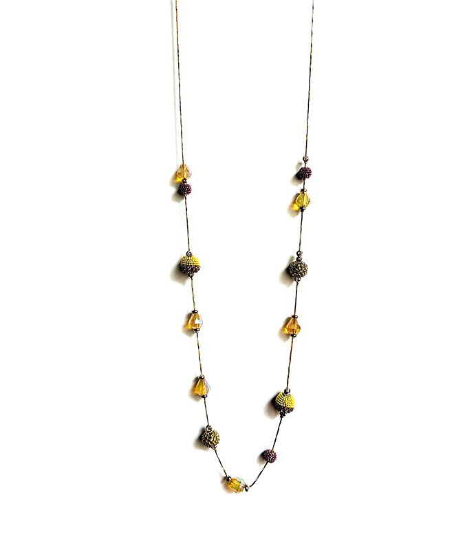 A NK2072 (Multi) necklace with yellow and brown glass beads.