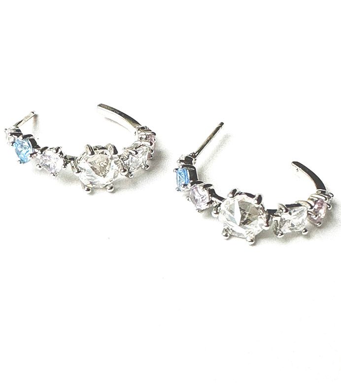 A pair of E0736 hoop earrings with blue and white crystals.