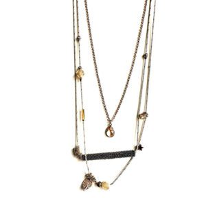 A necklace with a NK0707 and a bead on it.