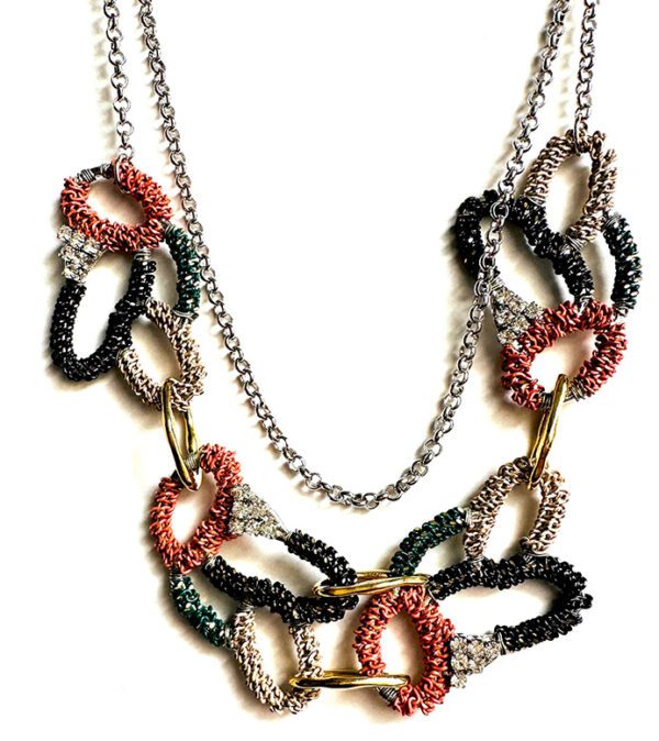 A NK090 with multi colored beads and a chain.