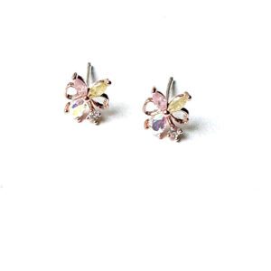 A pair of E0700 earrings on a white surface.