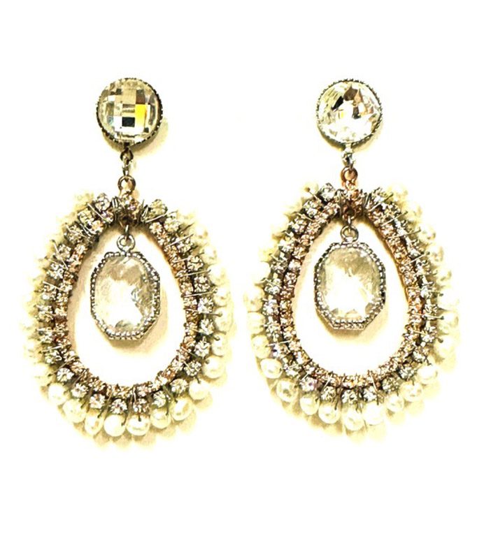 A pair of E726101 earrings with pearls and crystals.