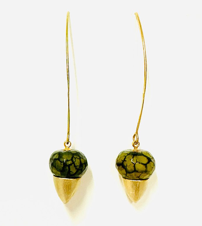 A pair of E102636 earrings with acorns on them.