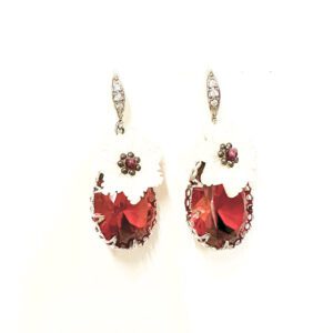 A pair of E00609 (Ruby) earrings with red and white flowers.