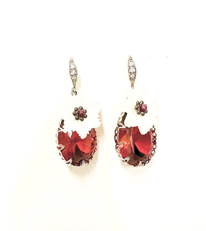 A pair of E00609 (Ruby) earrings with red and white flowers.