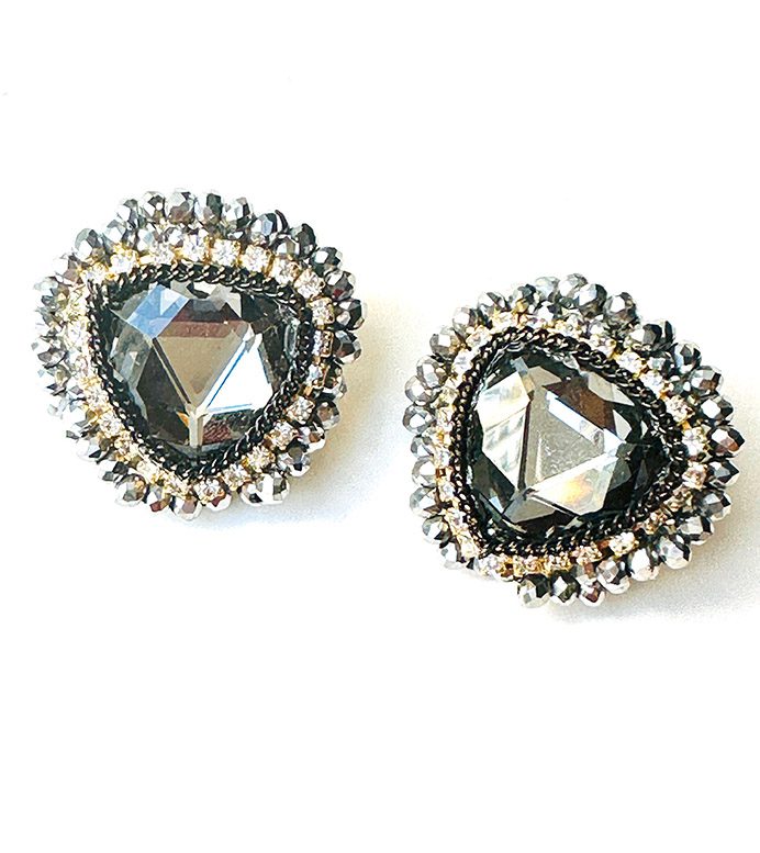 A pair of E81154 (Silver) earrings with black crystals and beading.
