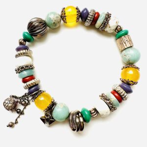 A B5918 with colorful beads and charms.