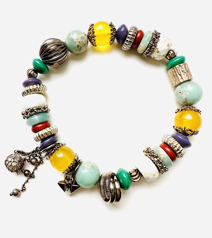 A B5918 with colorful beads and charms.
