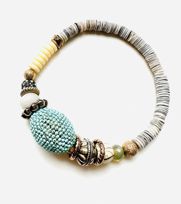 A B3203 with turquoise beads and silver charms.