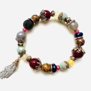 A B0508 with colorful beads and a tassel.