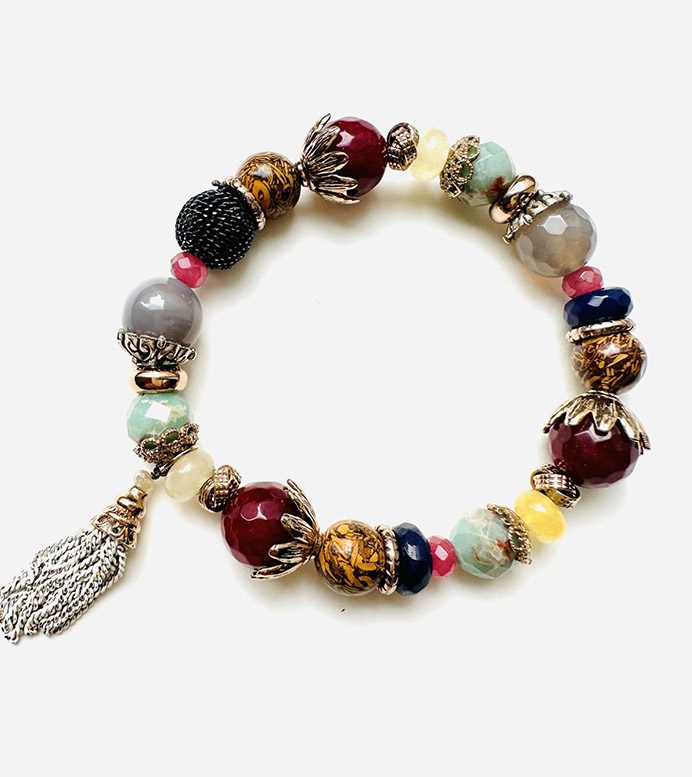 A B0508 with colorful beads and a tassel.