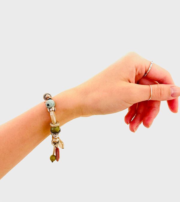 A woman's hand with a B0497 bracelet on it.