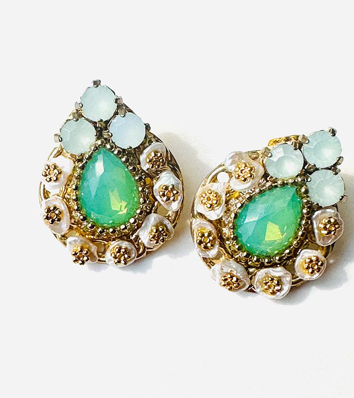 A pair of earrings with E8401 (Green Opal) stones.