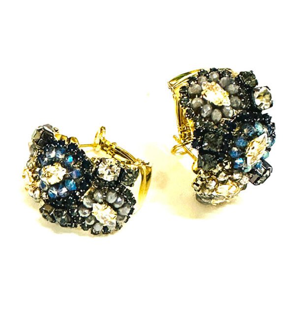 A pair of E5005 earrings with black and white crystals.