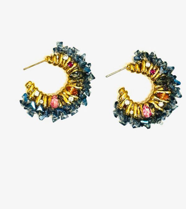 A pair of E4139 hoop earrings with multi colored stones.