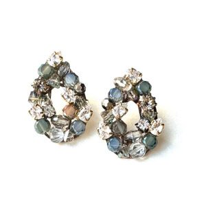 A pair of E2485 with blue stones and crystals.