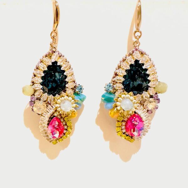 A pair of E5017 (Holiday) earrings with colorful stones and beads.